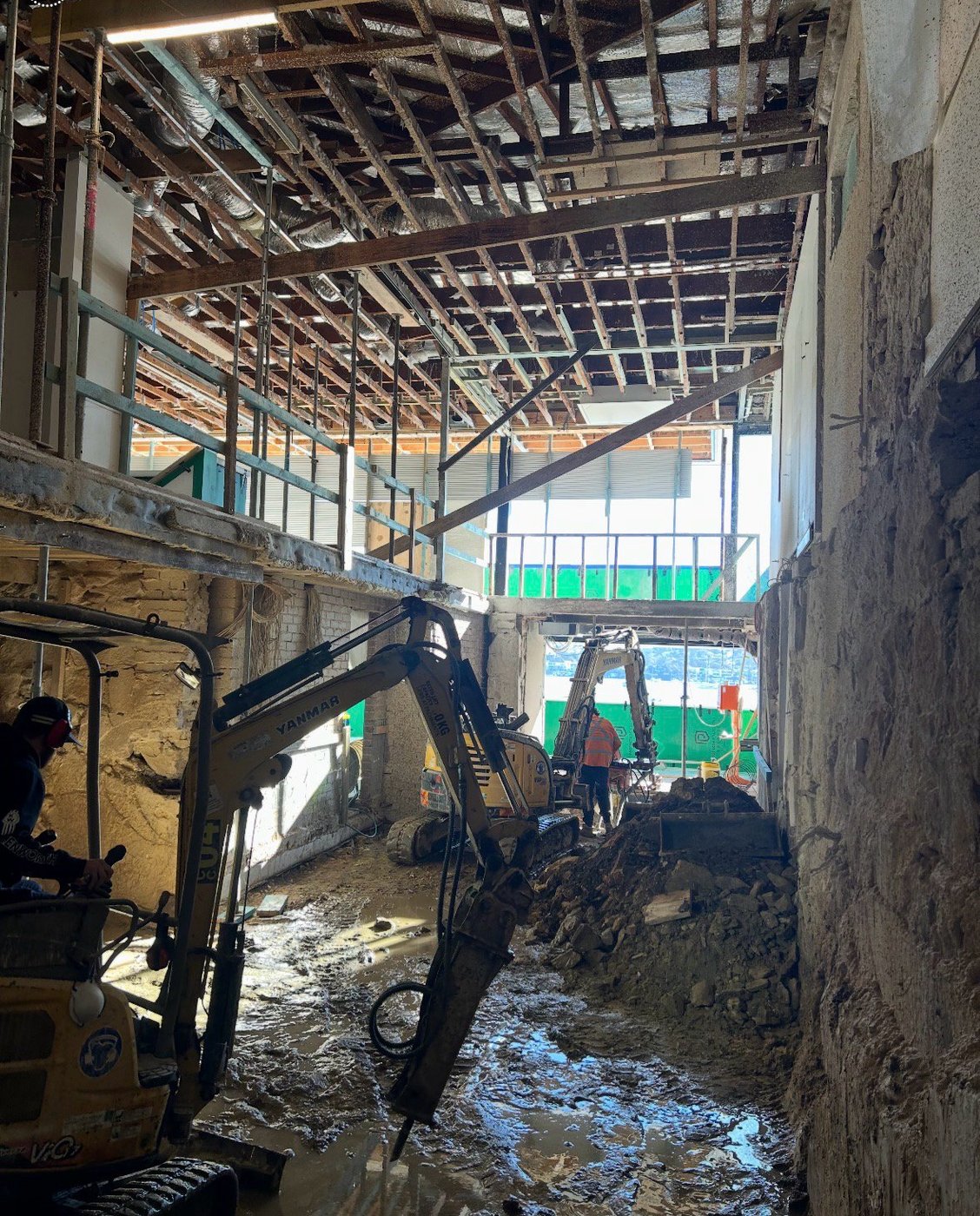 Excavators carrying out commercial internal demolition
