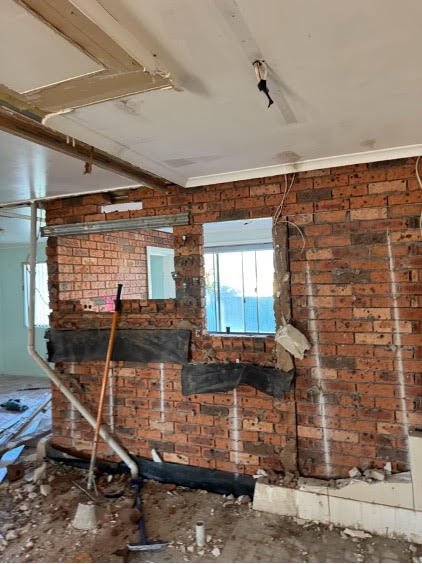 Internal brick feature wall during strip out